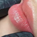 Permanent makeup artist performing a touch-up service to refresh brows and enhance long-lasting results in Boca Raton