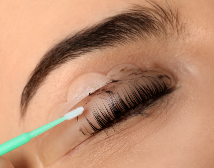 Client receiving a professional lash tint treatment at Boca Skin and Lash in Boca Raton Florida